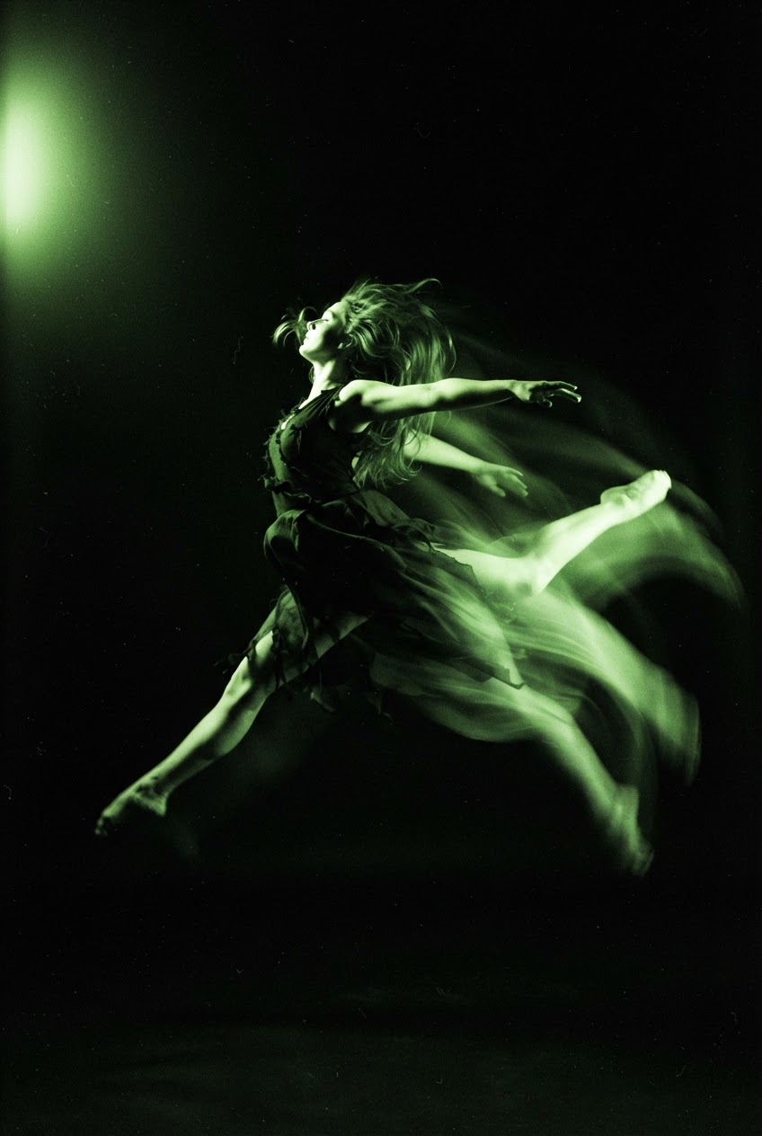 Dancer in green rim light